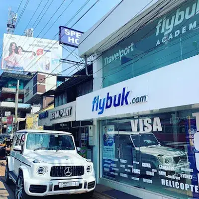 Flybuk | Travels In Kannur | Tour Operator In Kannur | Flight | Visa | Helicopter | Private Jet | Hotels | Cargo logo