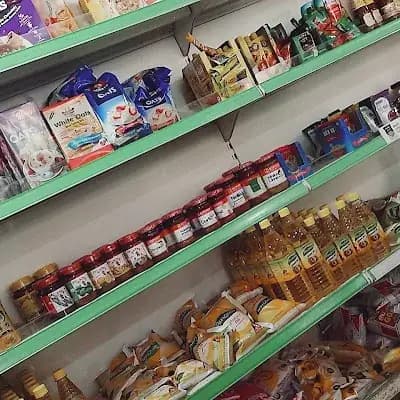 Dhanya Supermarket Vettucadu logo
