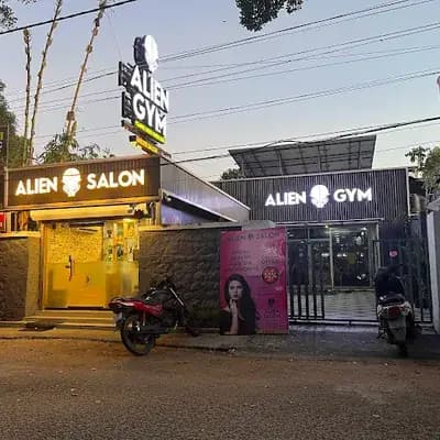 Alien Salon Kollam logo