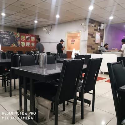 Kuzhi Mandi Restaurant logo