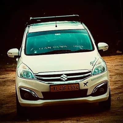 Munnar Travel Warriors logo