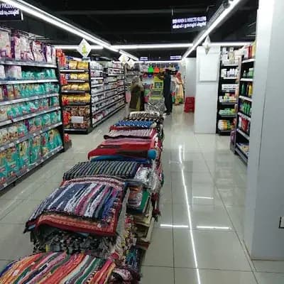 Kudumbini Supermarket logo