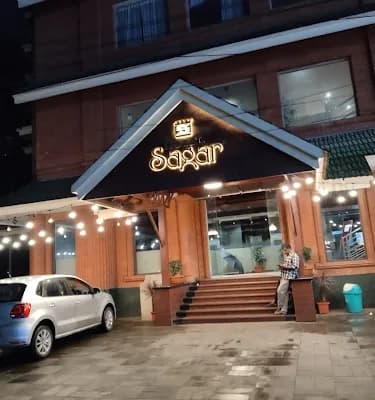 Hotel Sagar & Gourmet Store logo