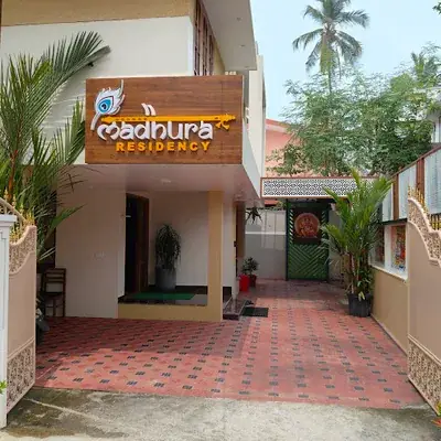 Madhura Residency logo
