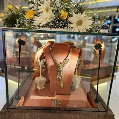 The Grand Gold And Diamonds logo