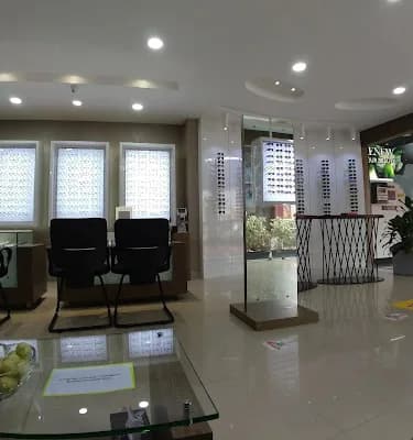 Mother Opticals @ East Forte Thrissur logo