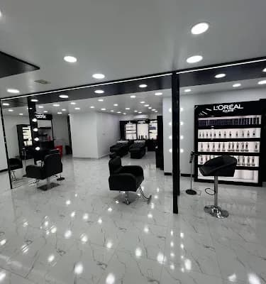 Treatmento Unisex Salon Kottayam logo