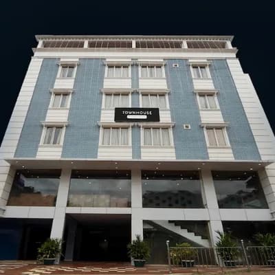 Townhouse By Oyo Mg Road Trivandrum Formerly Nandanam Park logo