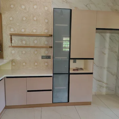 Rexon Interiors Modular Kitchen Dealers Modular Kitchen Designers Interior Designer Kitchen Renovation Ernakulam logo