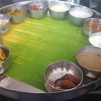 Madras Veg Tables Vegetarian Restaurant logo