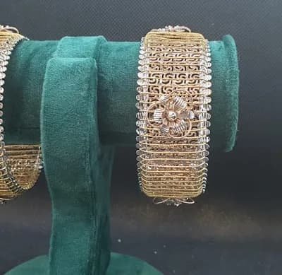 P N M Gold Silver Birthstones logo