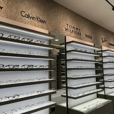 Lenzon Opticals || Sunglasses || Frames || Lens || Contact Lens || Eye Testing logo