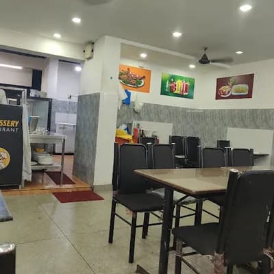 Thalassery restaurant logo