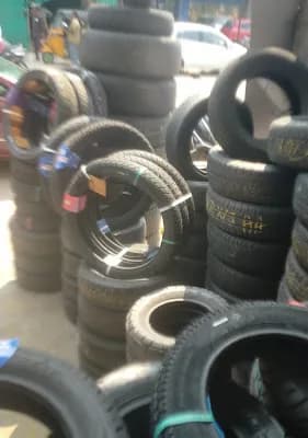 Sivaparvathy Tyres Bharath Lodge Building logo