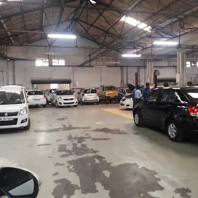 Maruti Suzuki Arena Indus Motors Kochi Mg Road logo