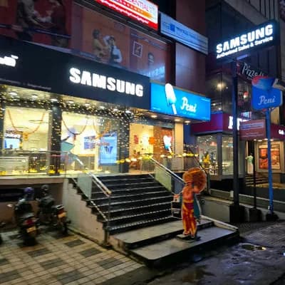 Samsung Experience Store Stadium Bypass Road logo