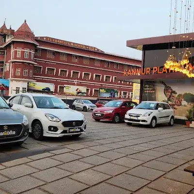 Car And Bike By Mahindra First Choice Kannur Platinum Drive logo