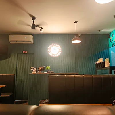 Ice Lounge Cafe n Scoops logo
